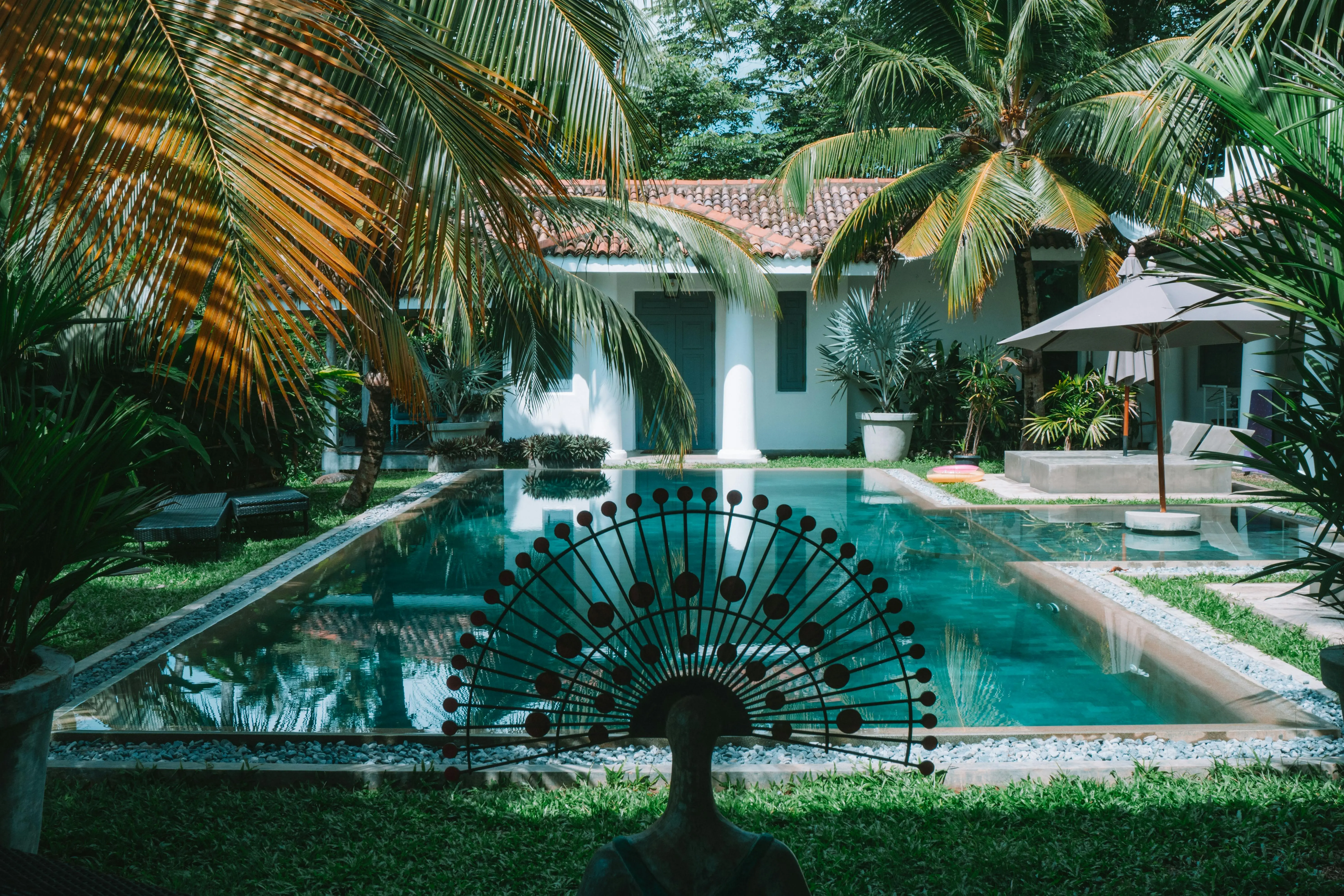 view of an outdoor swimming pool of a resort in port blair