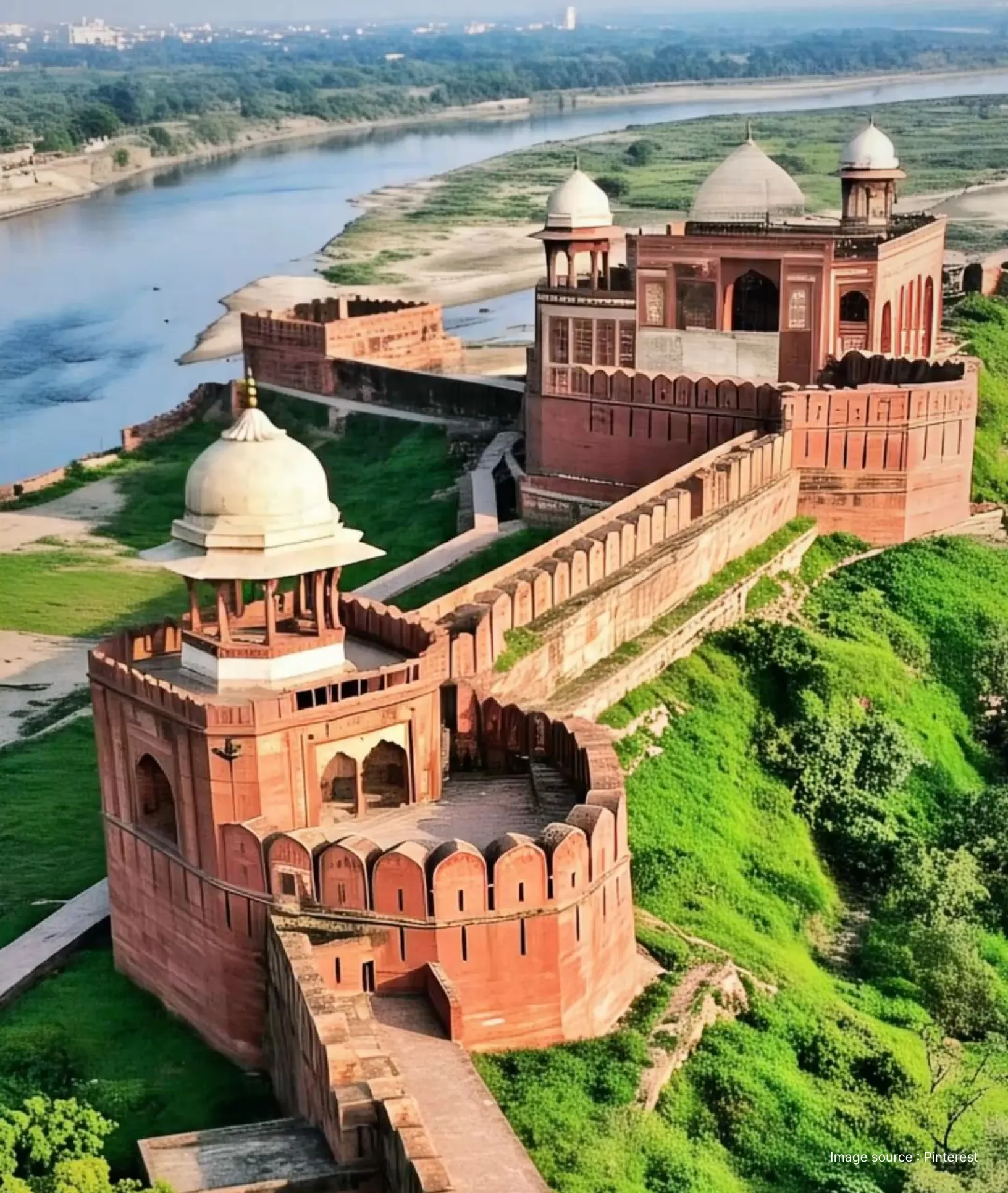 Aerial view of Agra Fort showing the magnificent structure and Yamuna river flowing adjacent to it