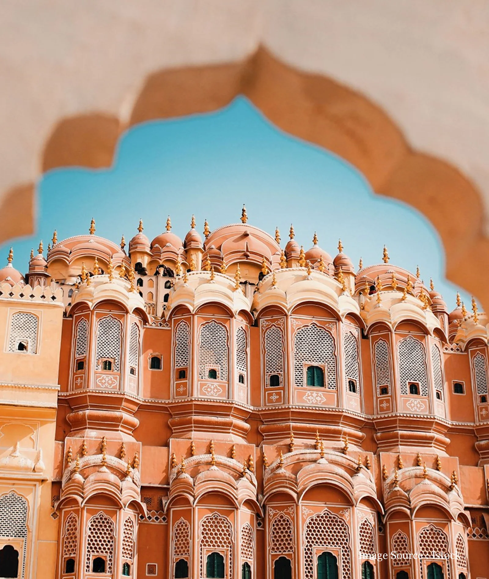 view of the top of Hawa Mahal from the jharokha of a building in front of the Hawa Mahal of Jaipur