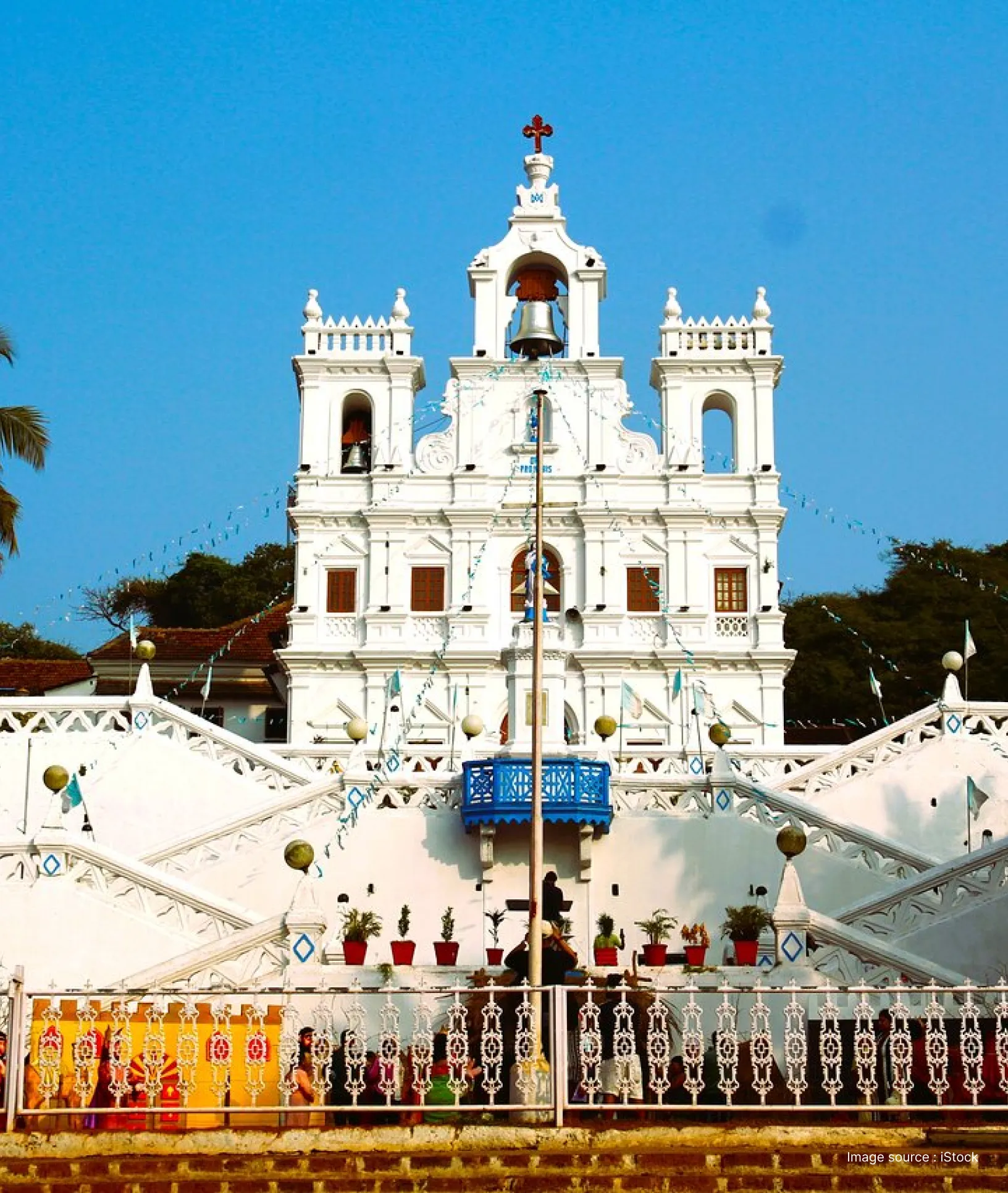 Our Lady of the Immaculate Conception Church in Panaji, Goa featuring its iconic white façade, bell towers, and central staircase