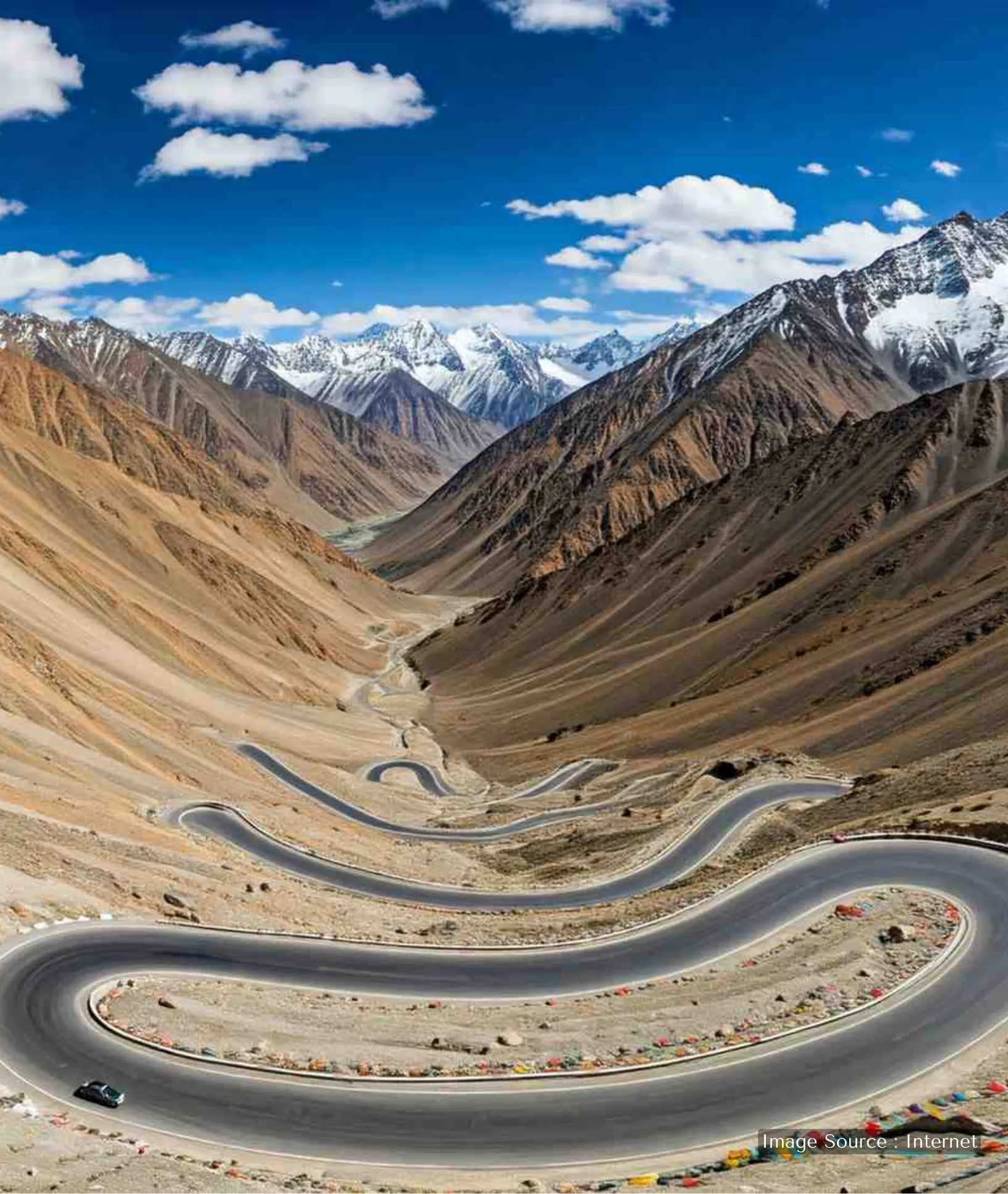 Winding mountain roads of a high-altitude motorable pass in Leh, Ladakh, popular for bike trips and adventure tourism.