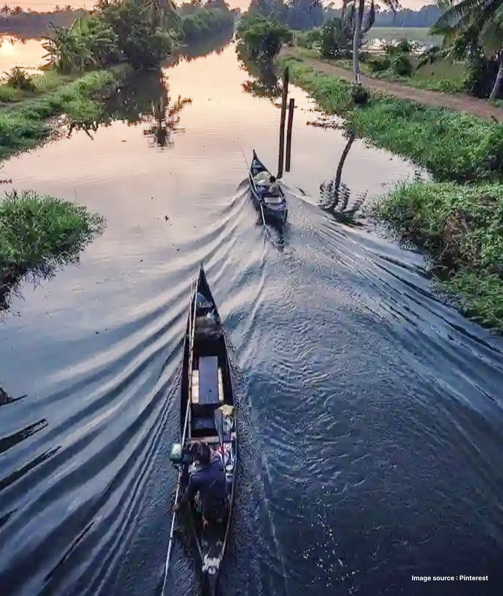 two canoes floating on the vembanad lake in alleppey