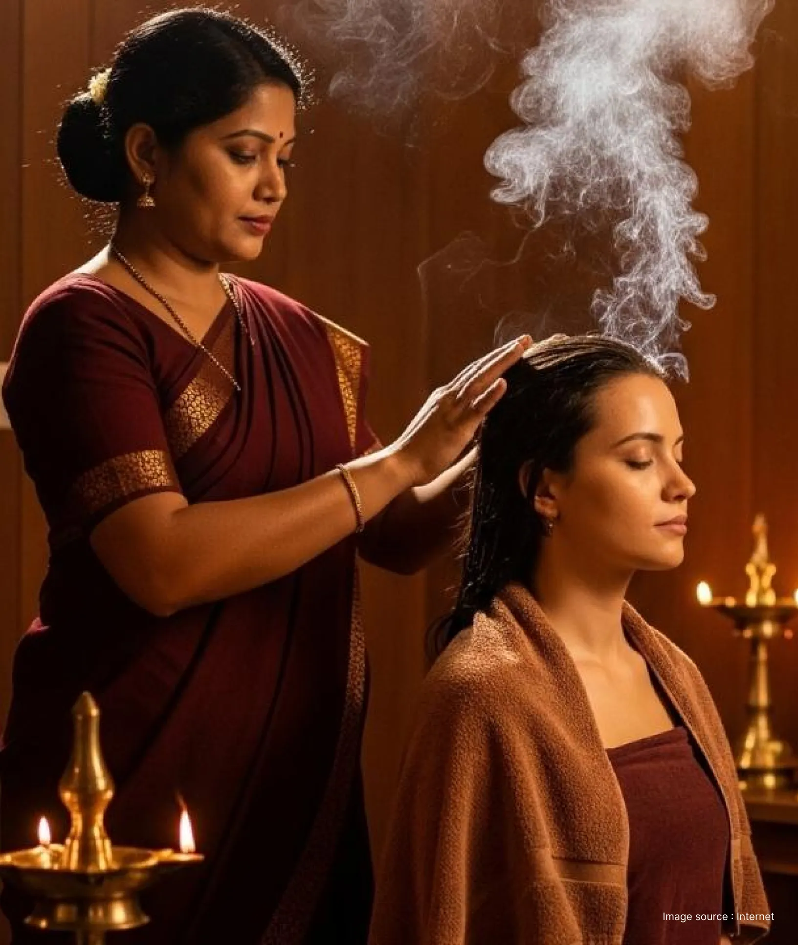 A woman performing traditional healing with smoke of natural herbs on another woman