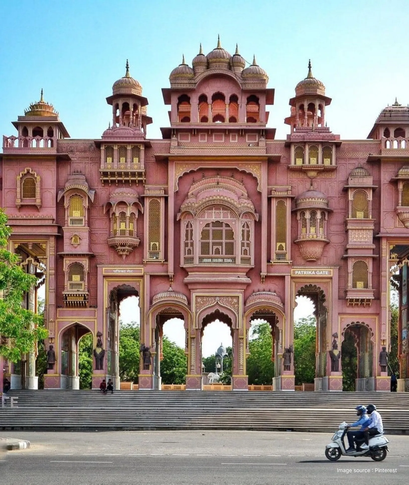 jaipur's intricately carved gate in jawahar circle painted in pink