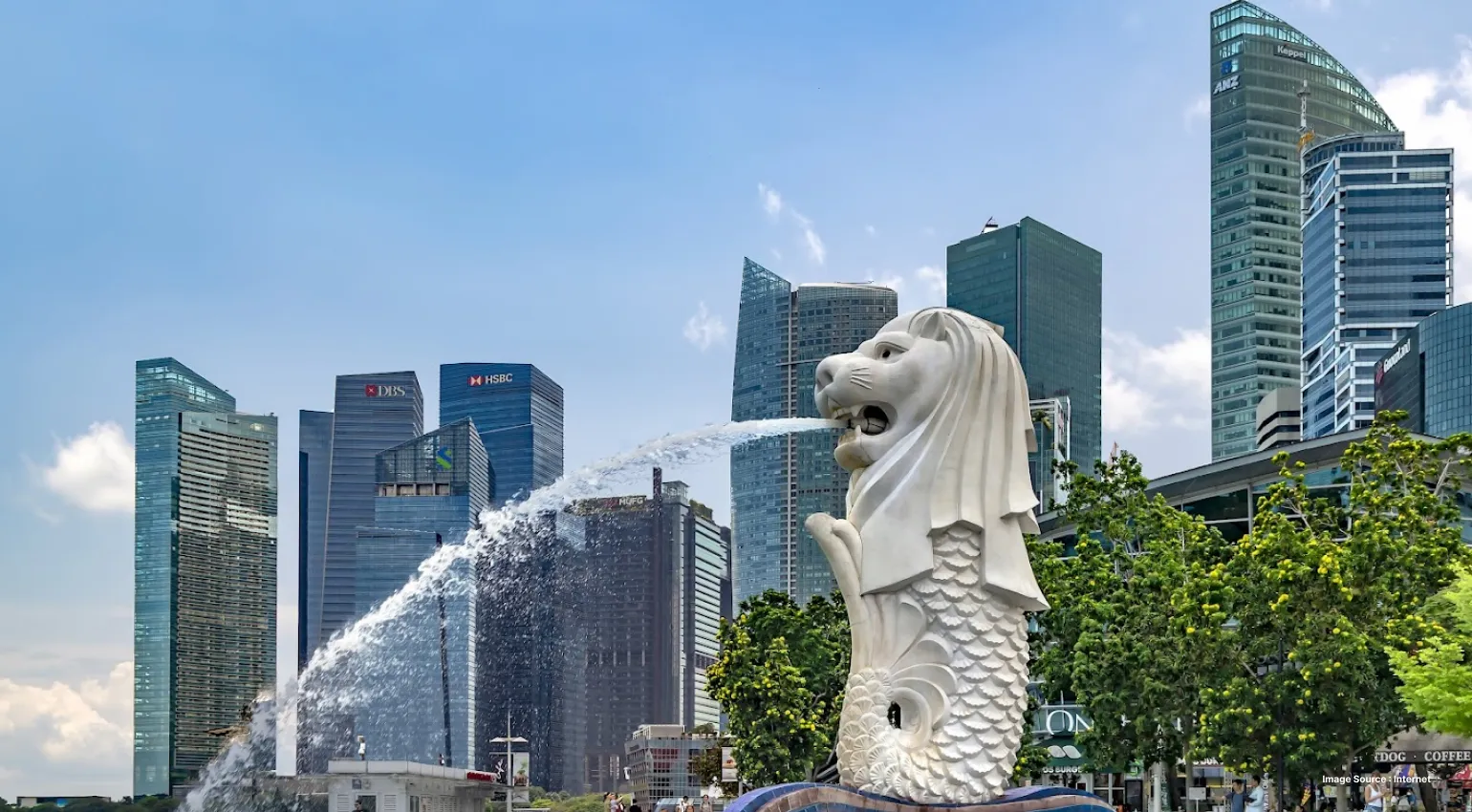 Iconic waterfront landmark featuring the Merlion statue, city skyline, and vibrant urban atmosphere.