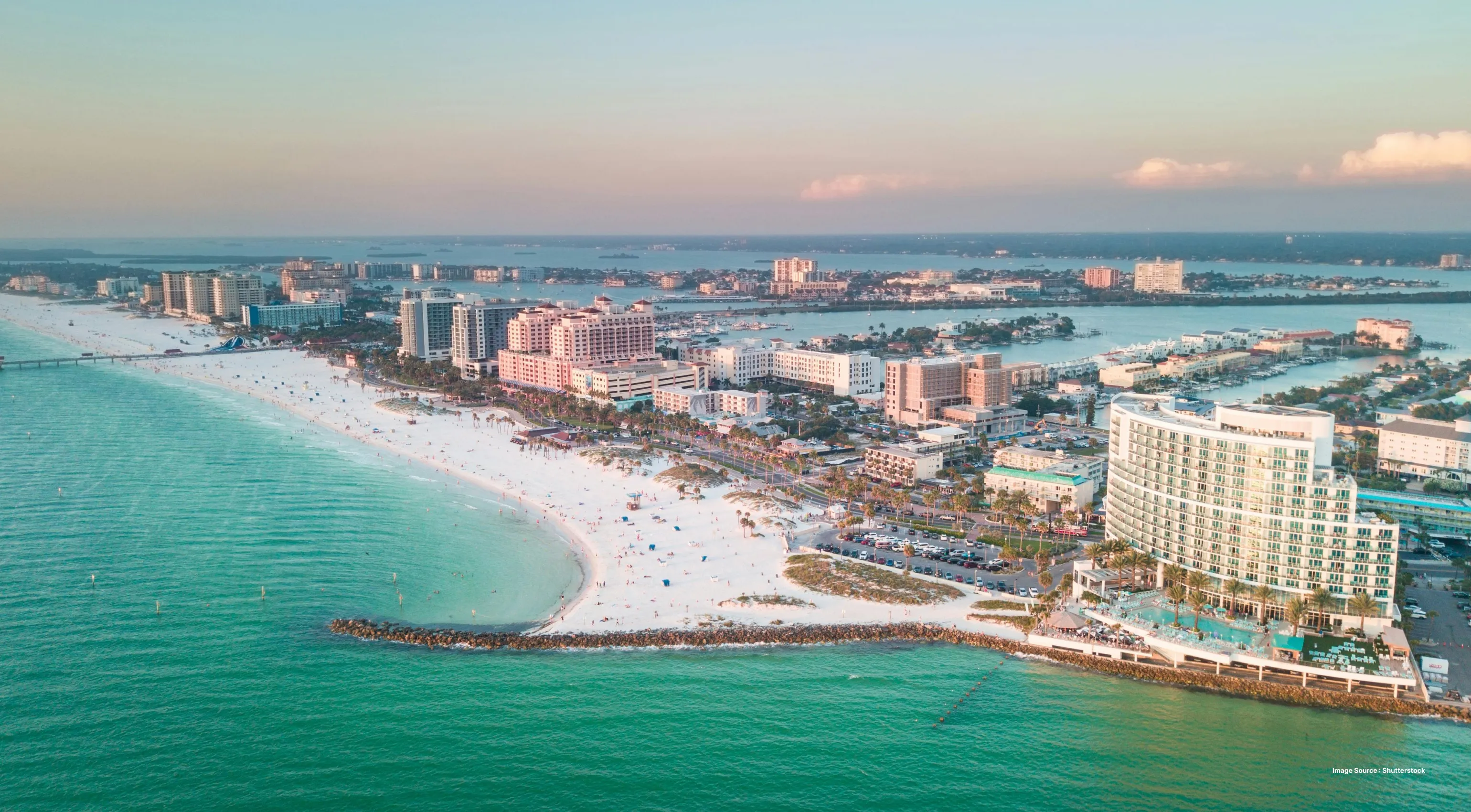 aerial shot of clearwater beach with large hotels on the coast