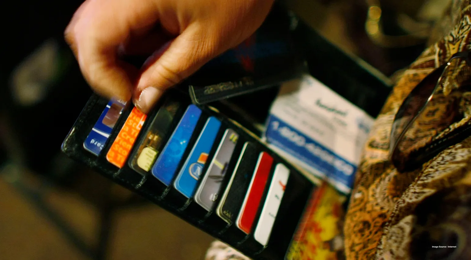 a collection of credit cards in a wallet