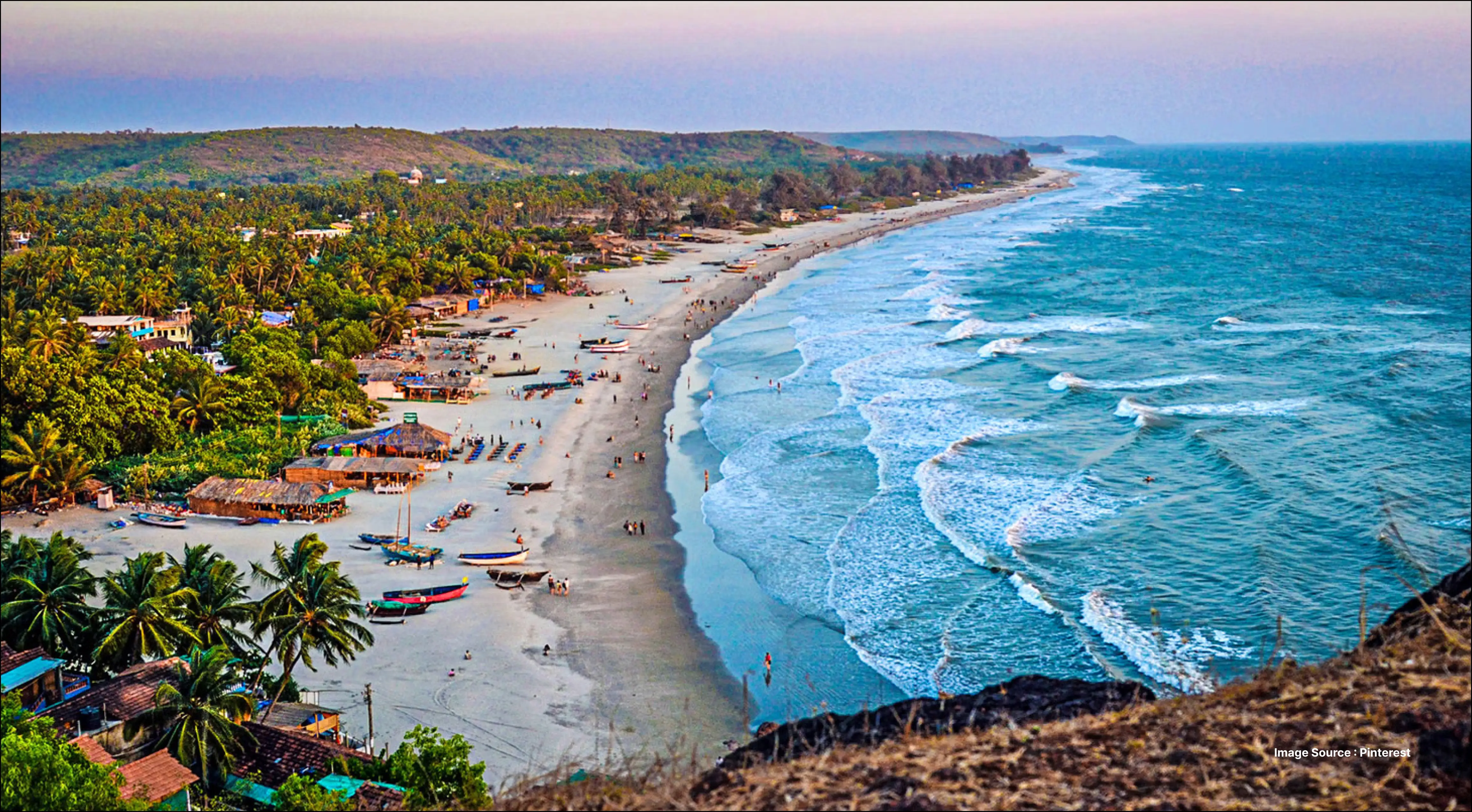 Scenic tropical beach with turquoise waves, palm trees, and beach huts offering a vibrant coastal vibe, inspiring travelers planning a trip to Bali from USA.