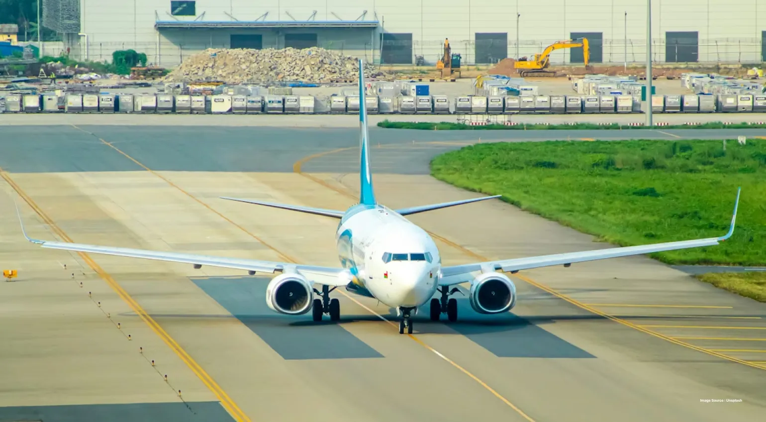 a KLM airlines airplane on standby on a runway