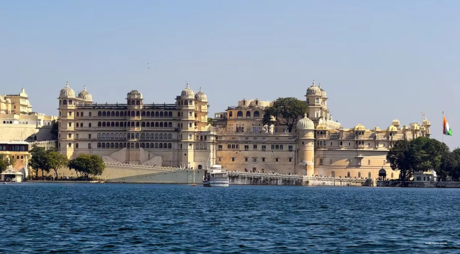 Majestic lakeside palace reflecting royal heritage and architecture