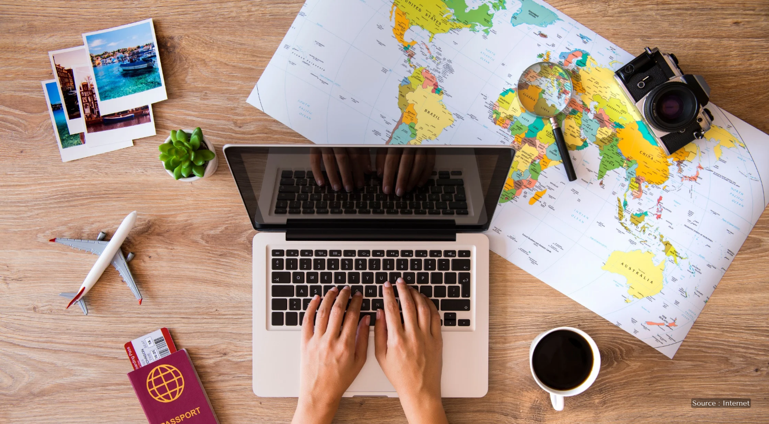 person planning their trip on a laptop