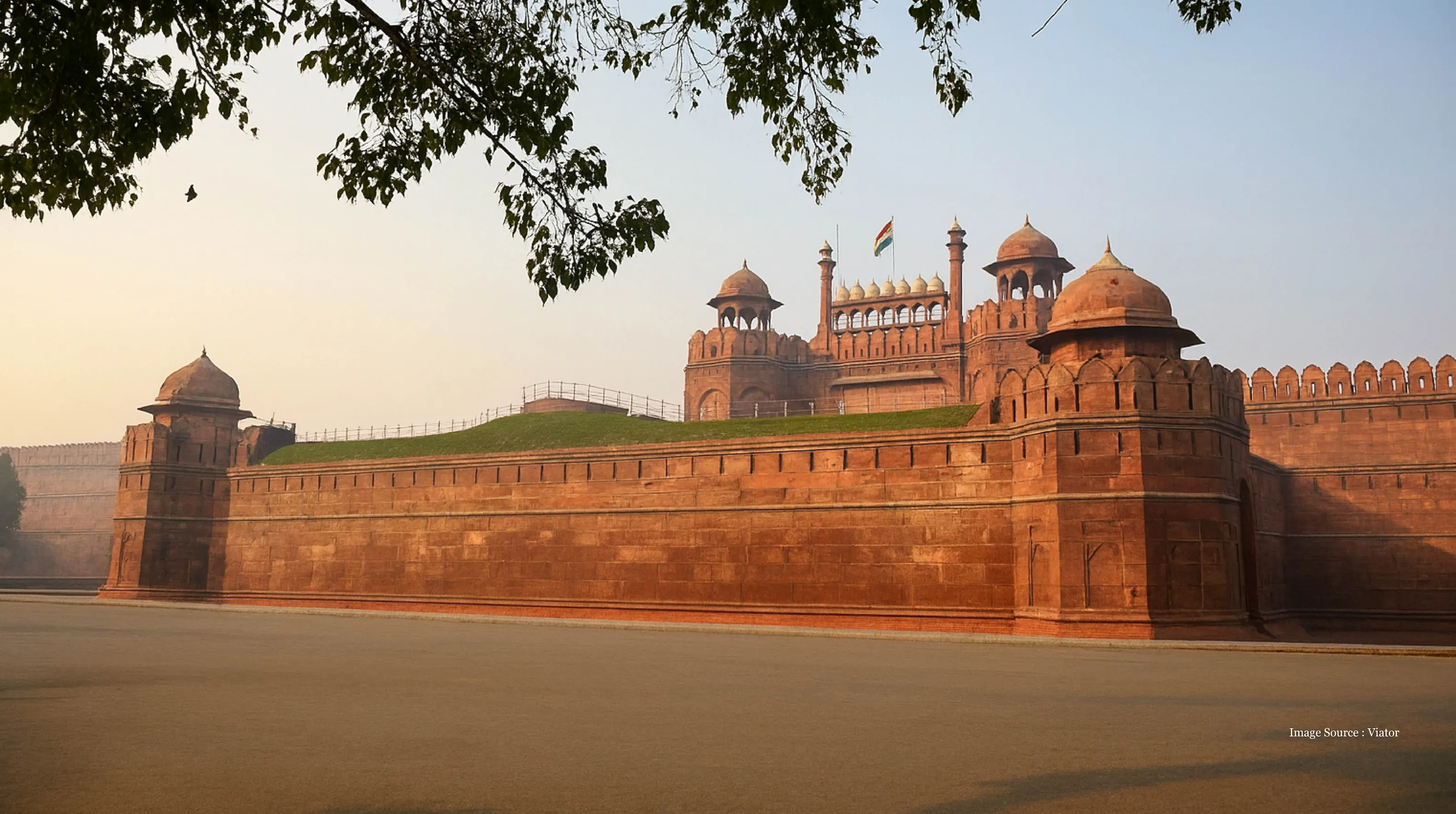 Red Fort ramparts at dawn, one of the unesco heritage sites in delhi"