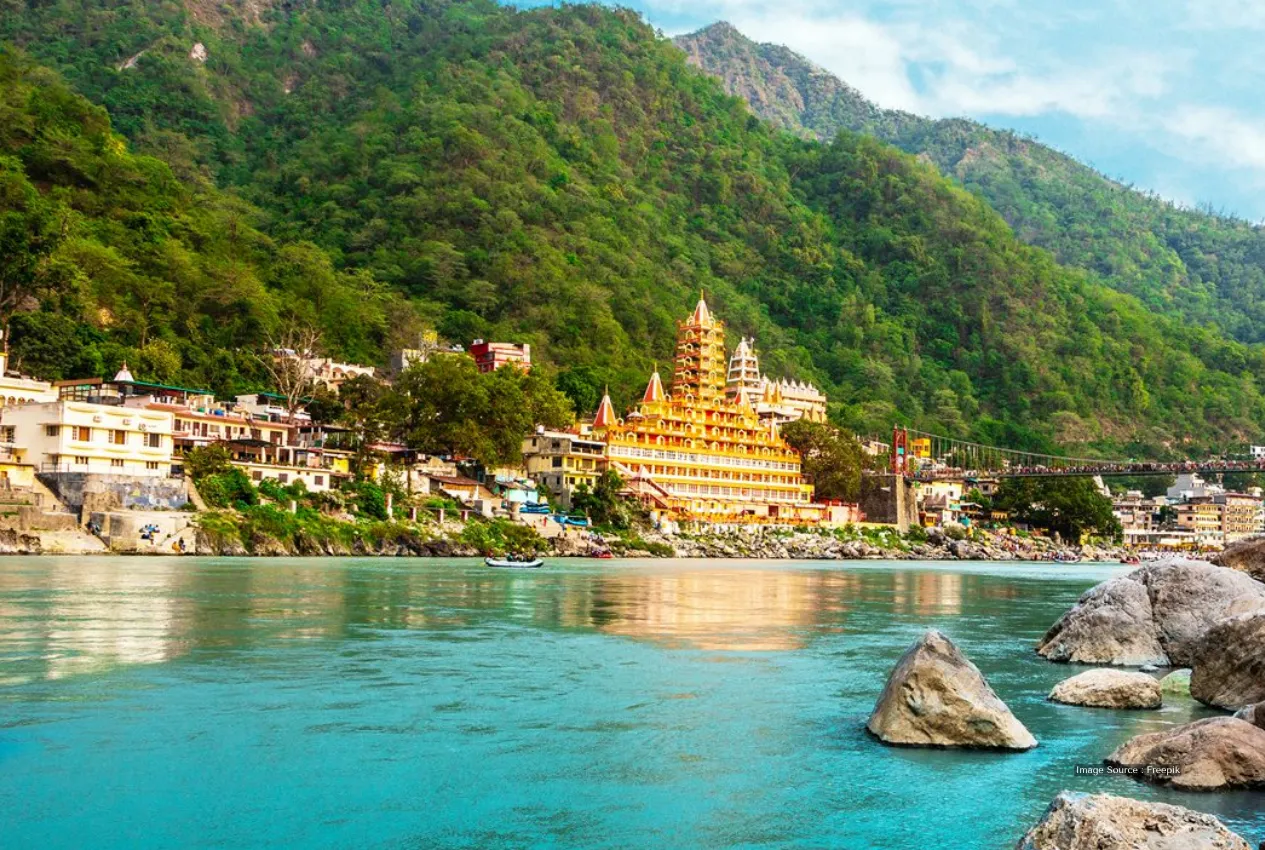 Luxury wellness retreats India with scenic river and lush mountains in Rishikesh