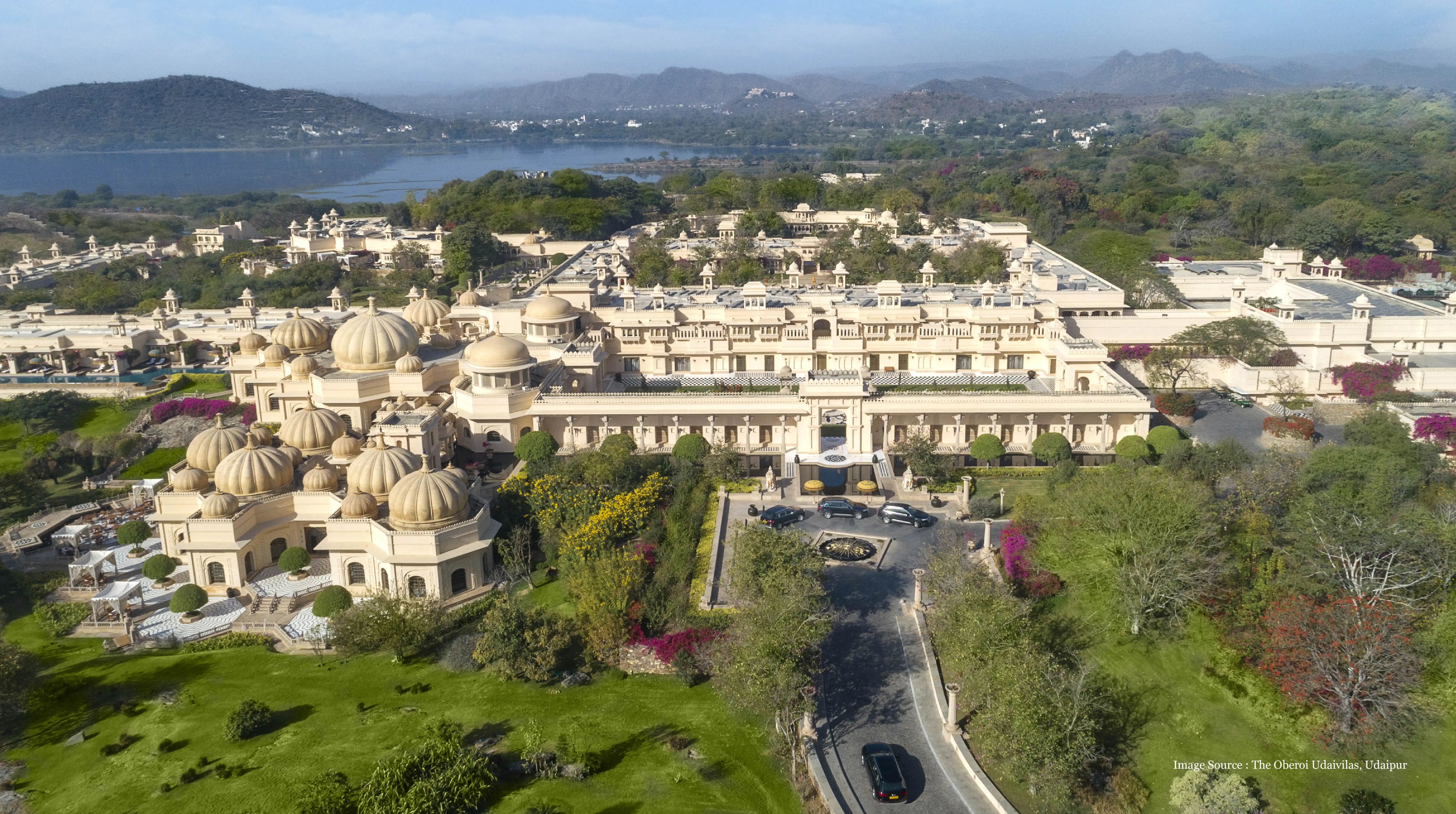 Trip to Udaipur featuring luxurious Oberoi Udaivilas palace and scenic landscape