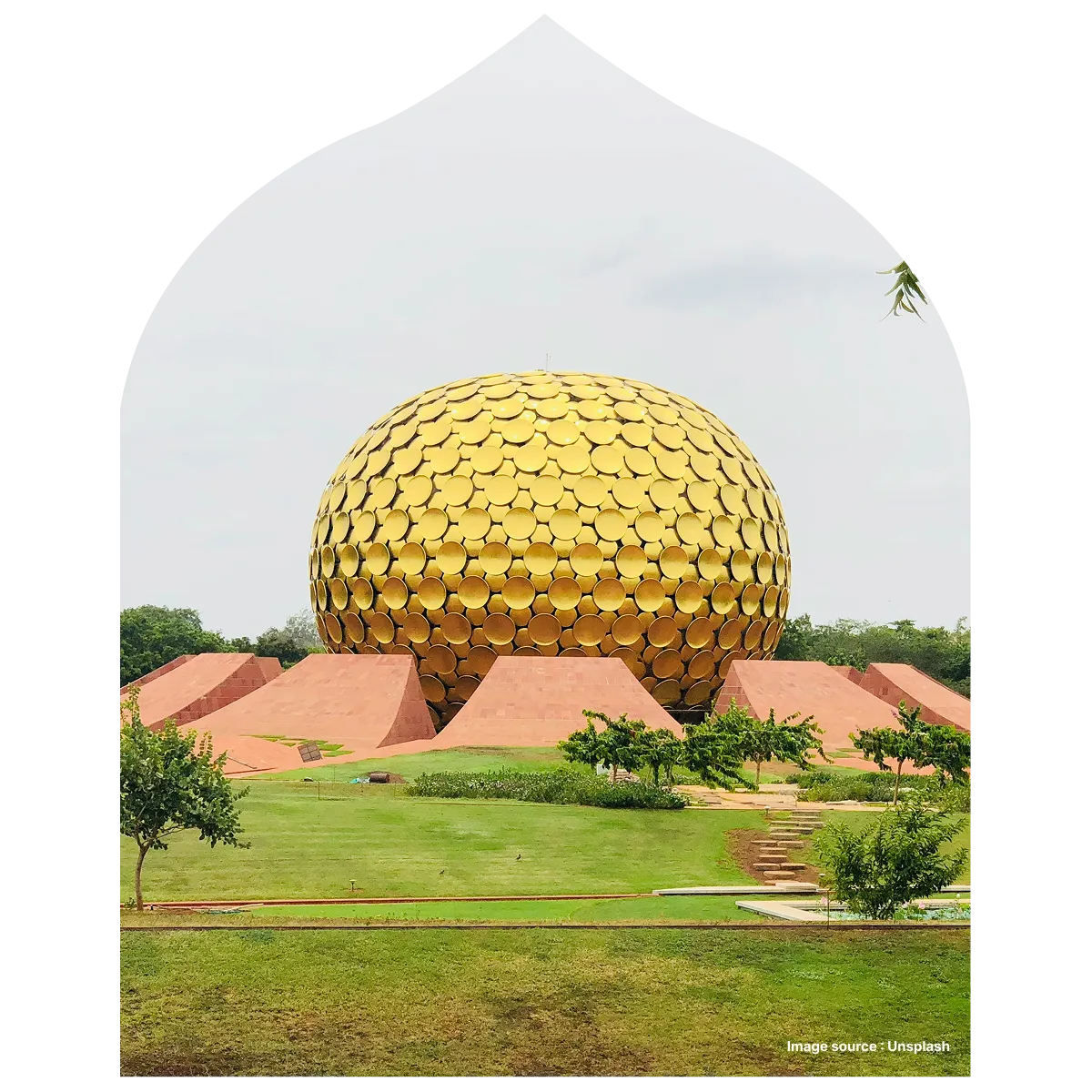 side view of the matrimandir's golden dome shaped architecture in auroville