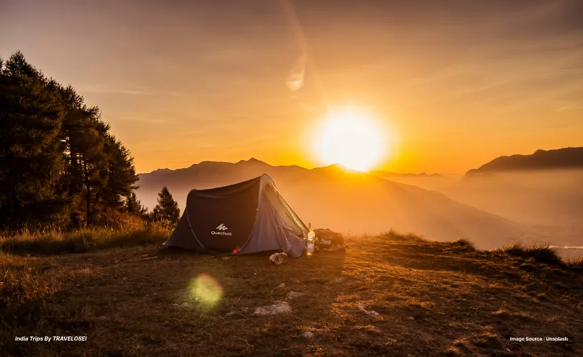 an image of a tent against a sunrise