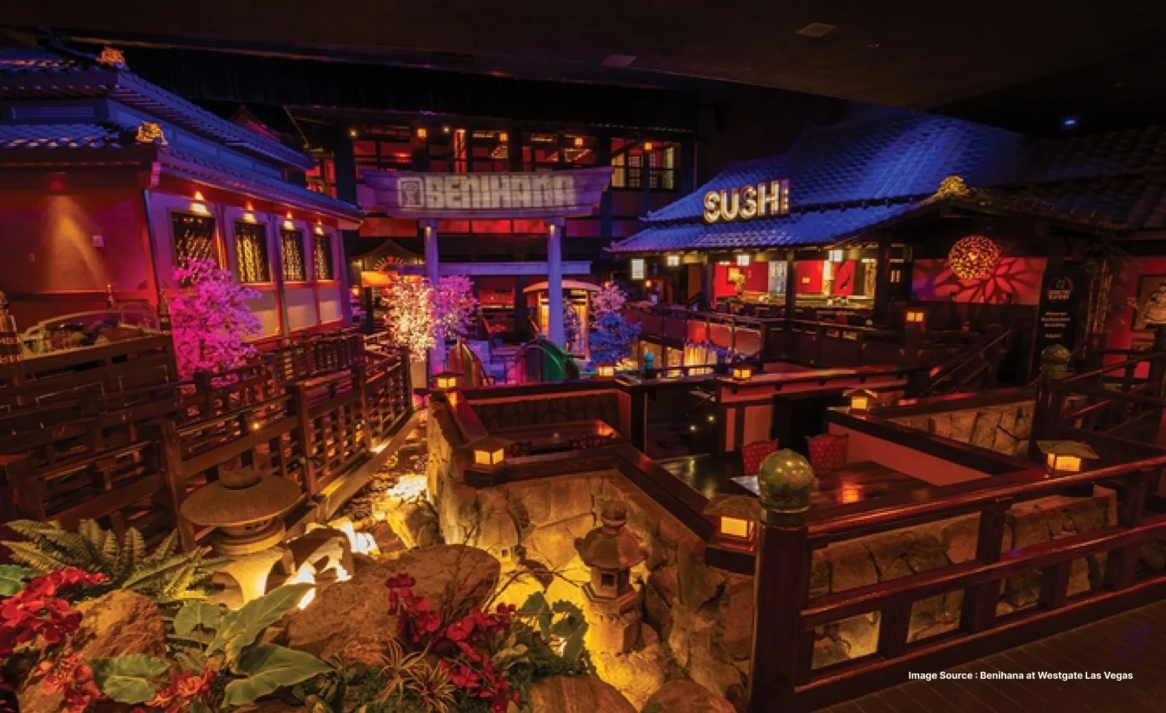 a vibrant restaurant in the westgate las vegas resort with colorful lighting and plants as decoration