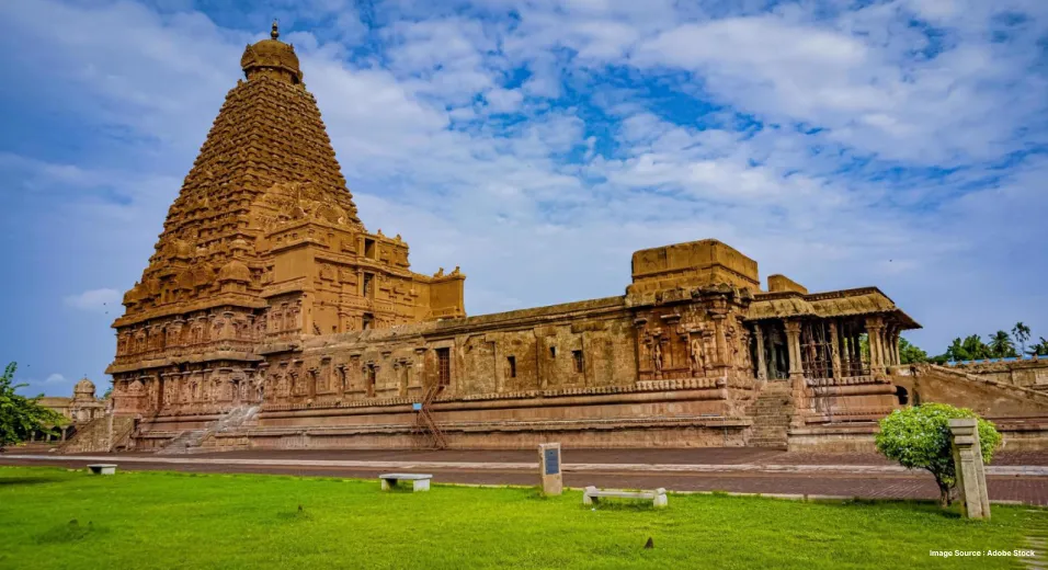 an ancient carved temple with intricate details and sculptures in daytime