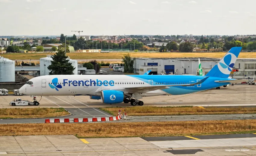 a parked french bee airplane