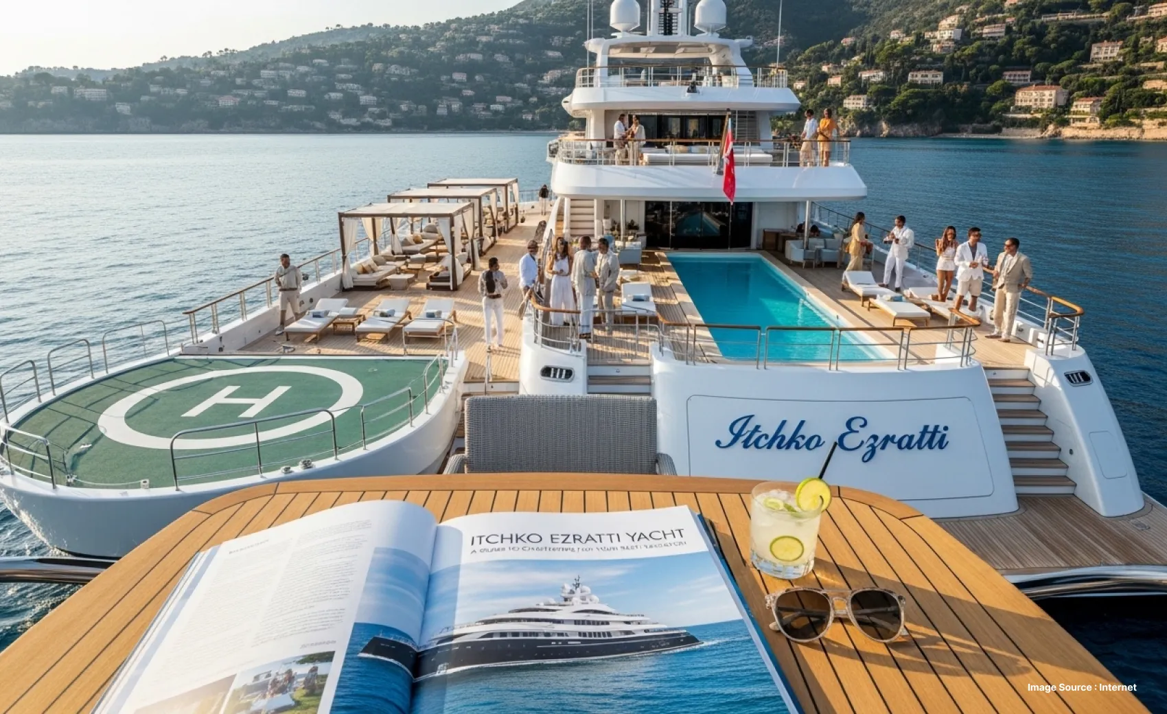 itchko ezratti yacht printed on magazine and labelled on the yacht deck with a helipad as guests socialise