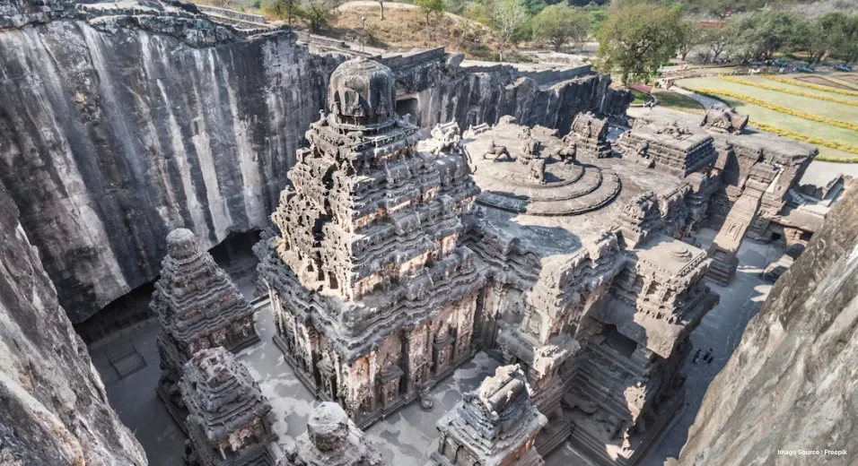 an underground carved intricate rock temple of an impressive scale