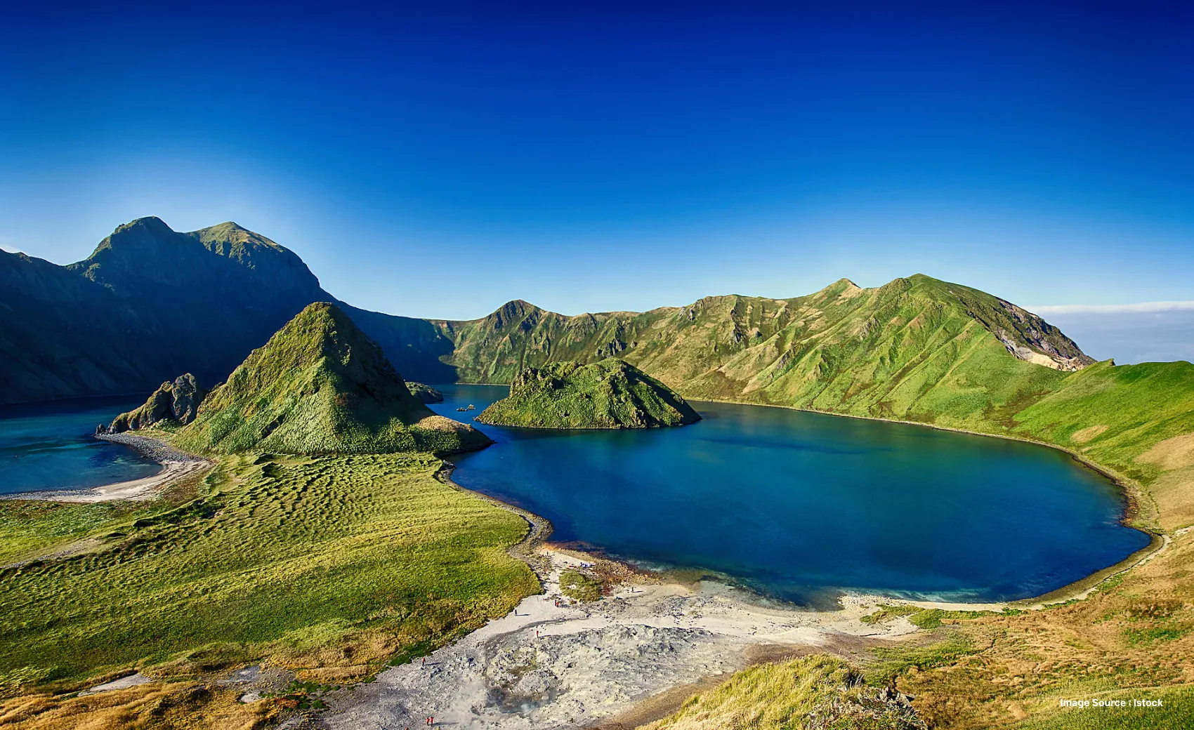 beautiful view of green hills on kuril islands with rugged landscape
