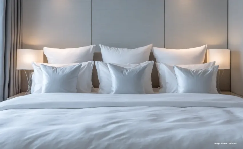 An image of different types of pillows on a bed