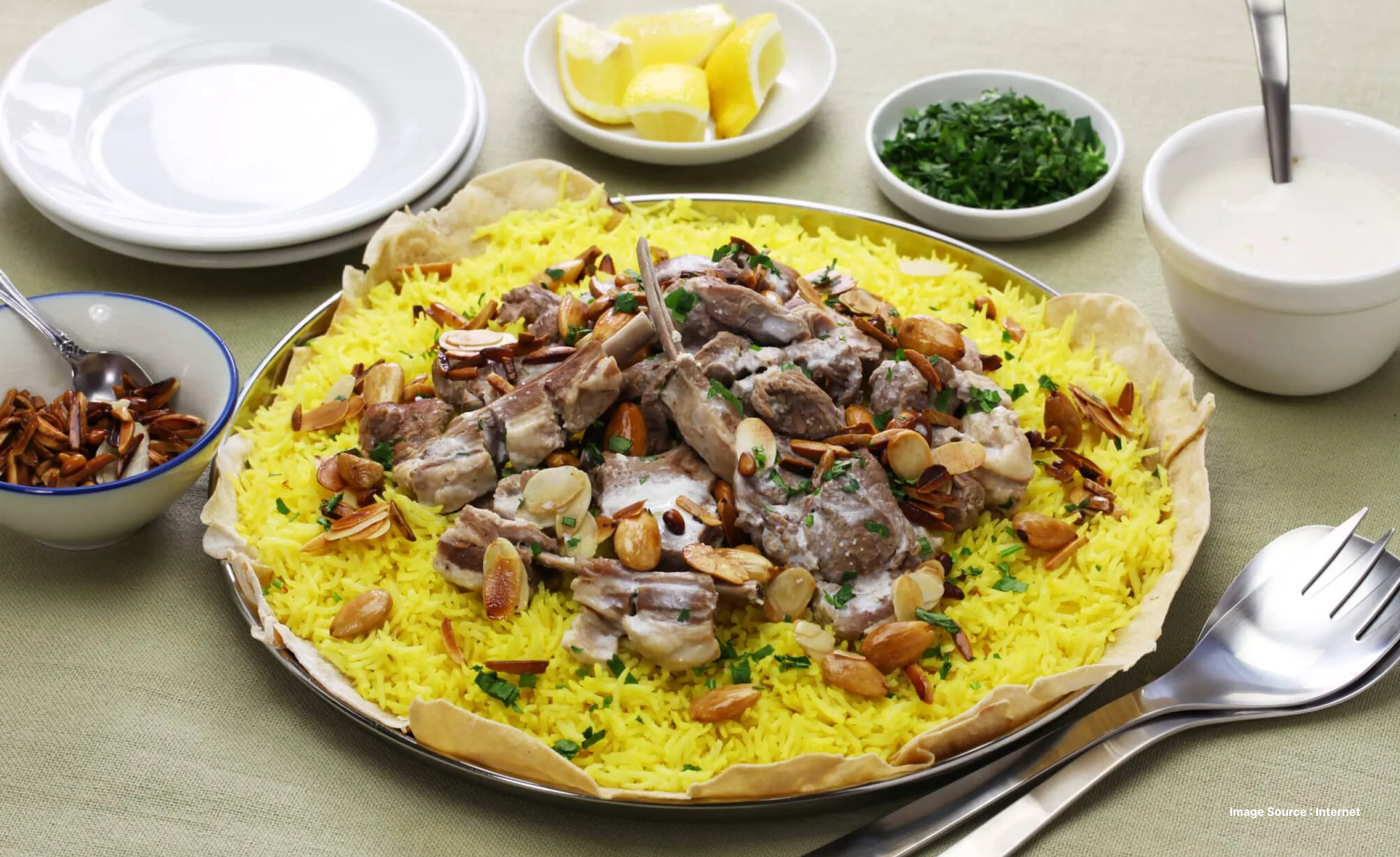 a beautifully served plate of mansaf, the national dish of Jordan made with meat & rice