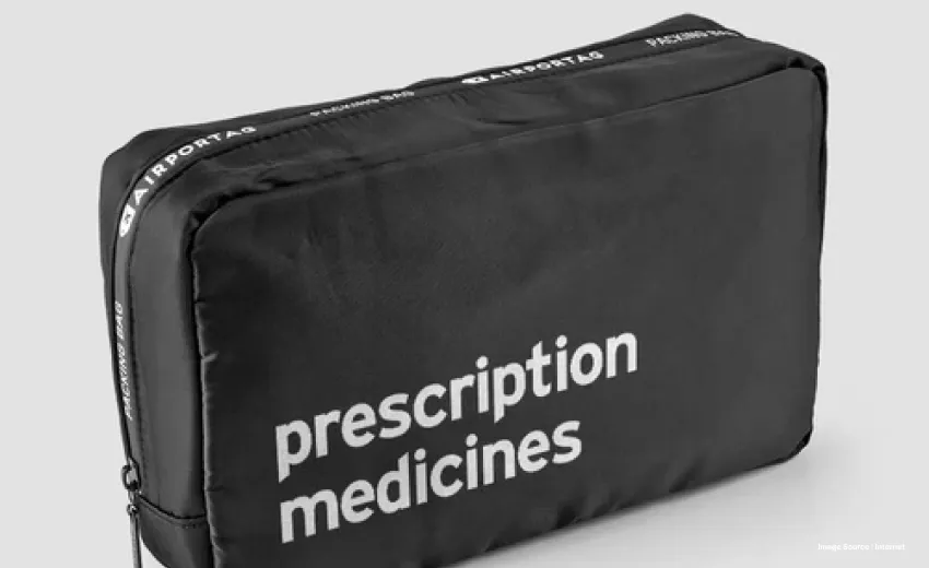 a black pouch saying "prescription medicines"