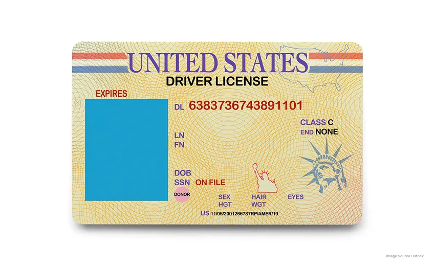 an image of a USA drivers license with masked photo of the citizen