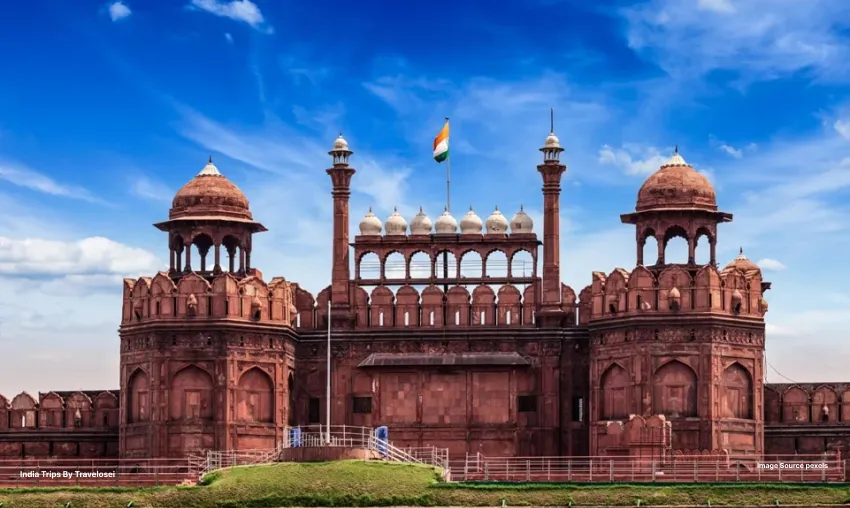 An image of an Indian heritage building against a blue sky