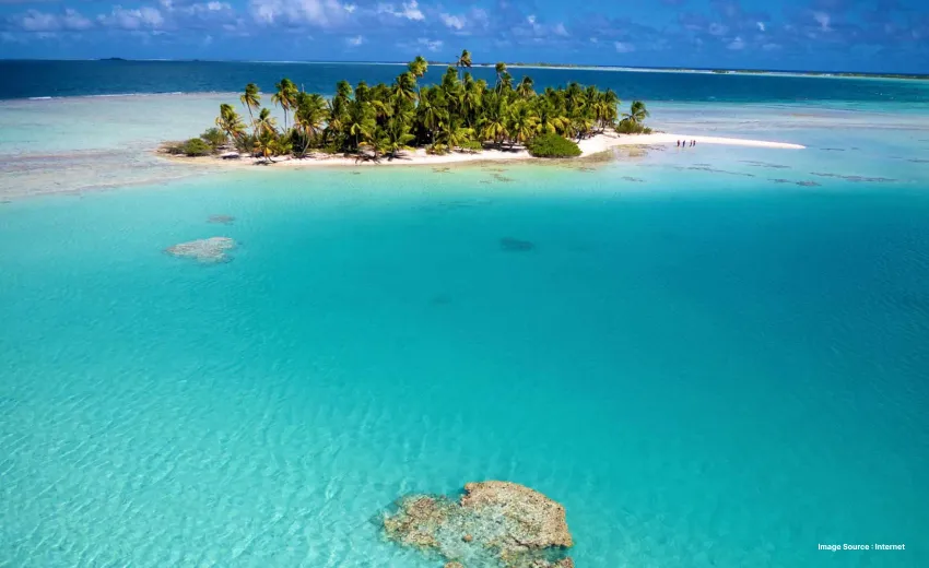 a beautiful click of french polynesia's island with green palm trees on its island