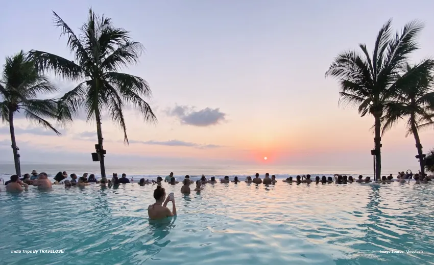 An image of people relaxing in the water of an island in Bali