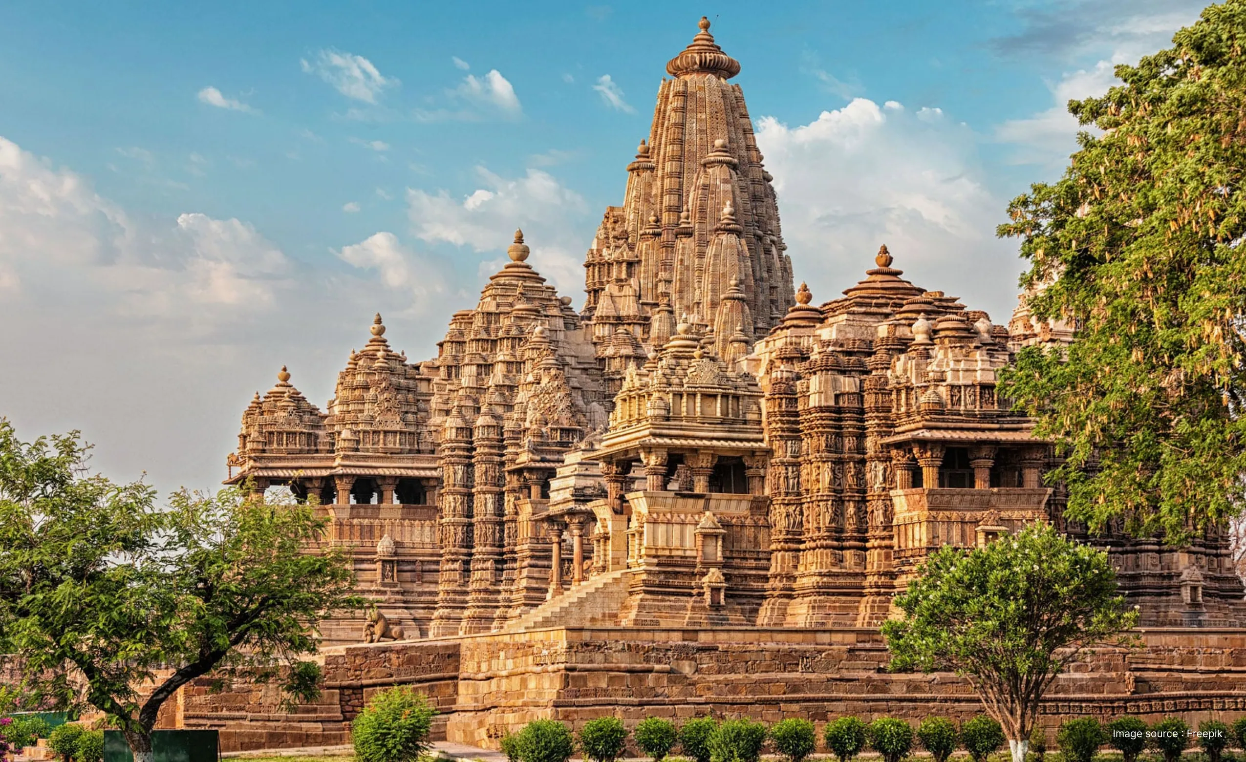 a front view of the khajuraho group of temples in daytime