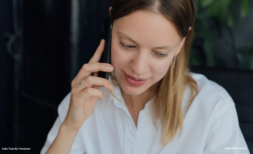A picture of a woman on the phone