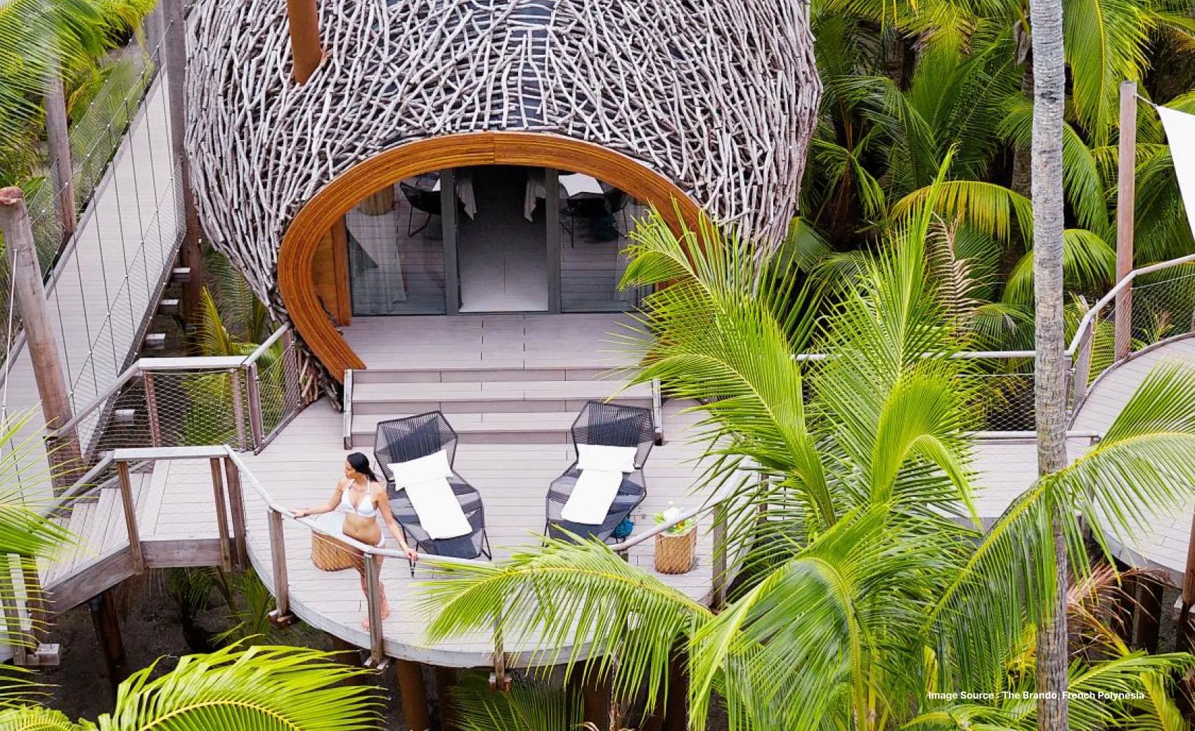 a uniquely designed private suite at the brando resort, surrounded by greenery