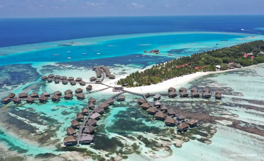 overwater stays on maldives right next to the beach with clear waters