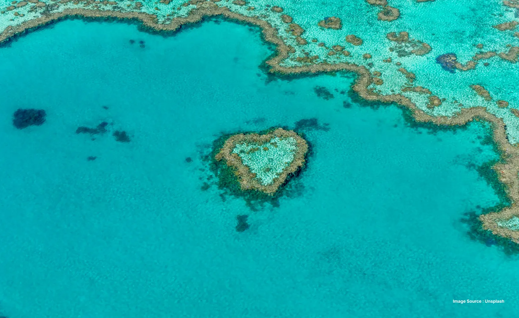 aerial view of the whitsundays island in queensland with crystal clear blue waters