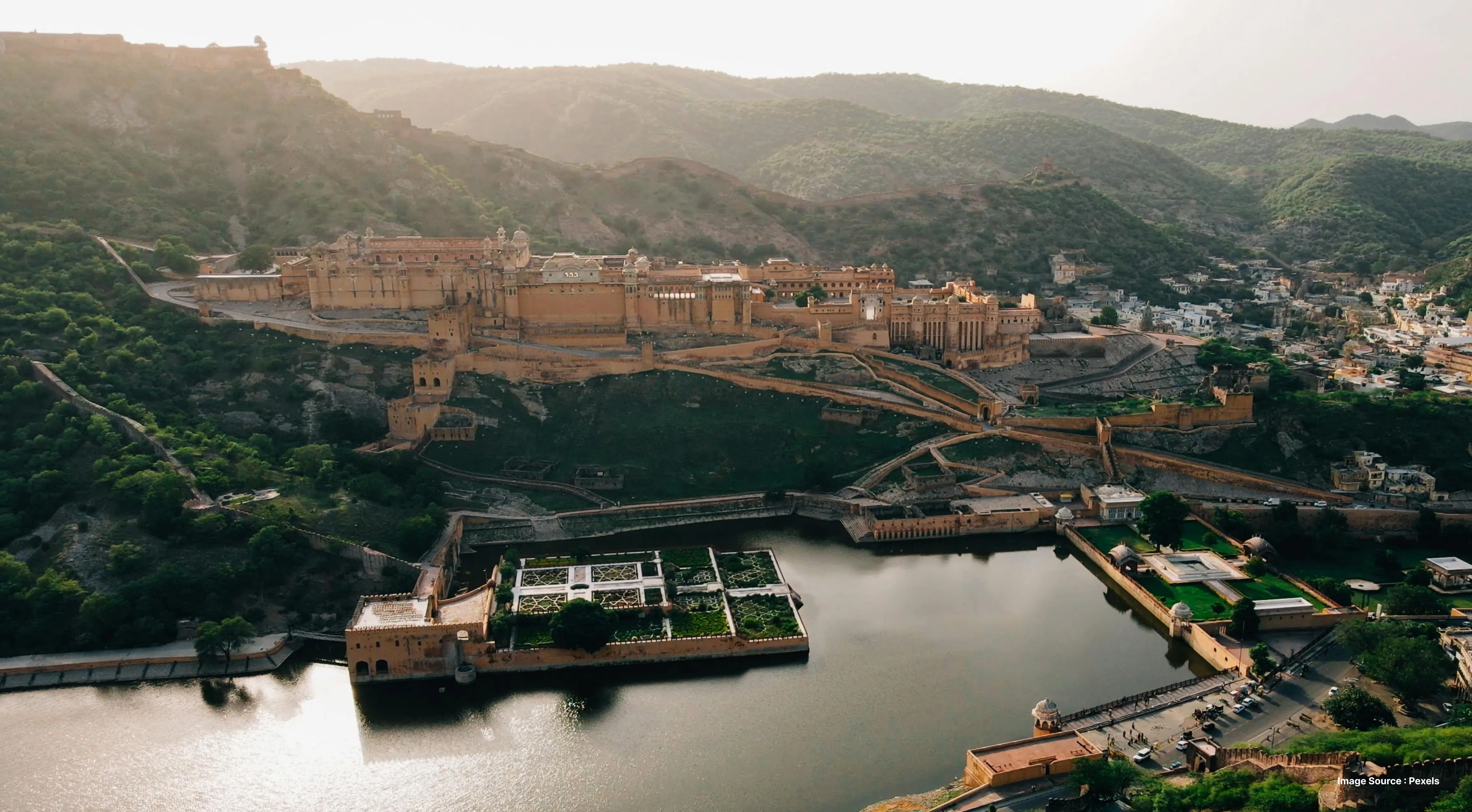 aerial view of the imposing amer fort, spread over a hilltop