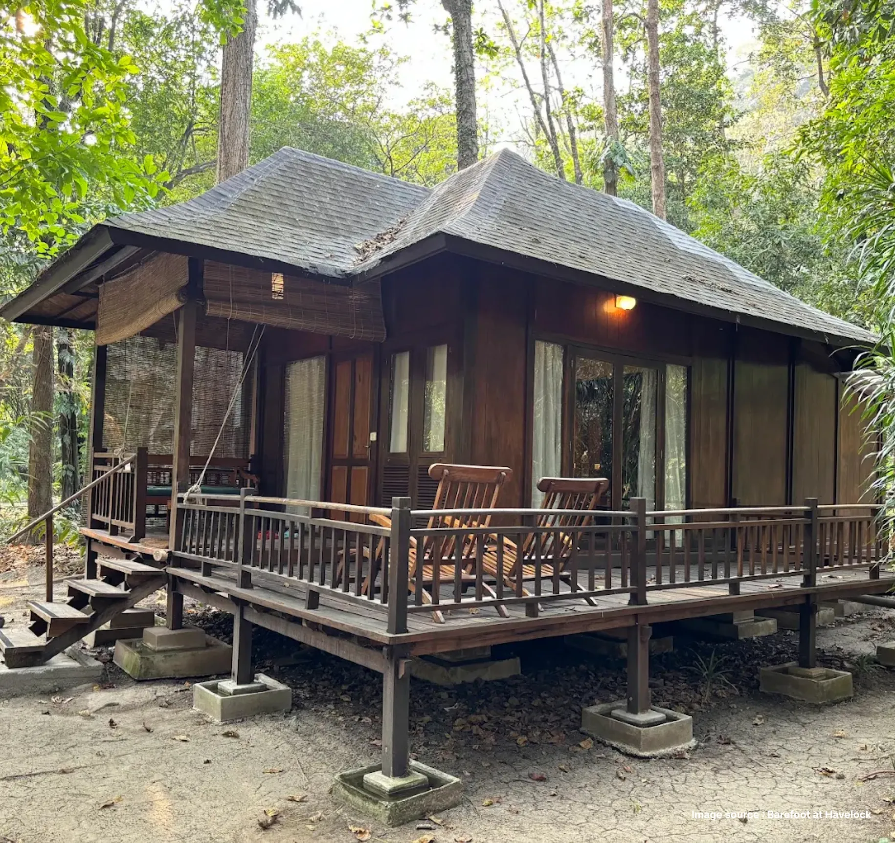 a wooden cozy cottage style villa accommodation at havelock