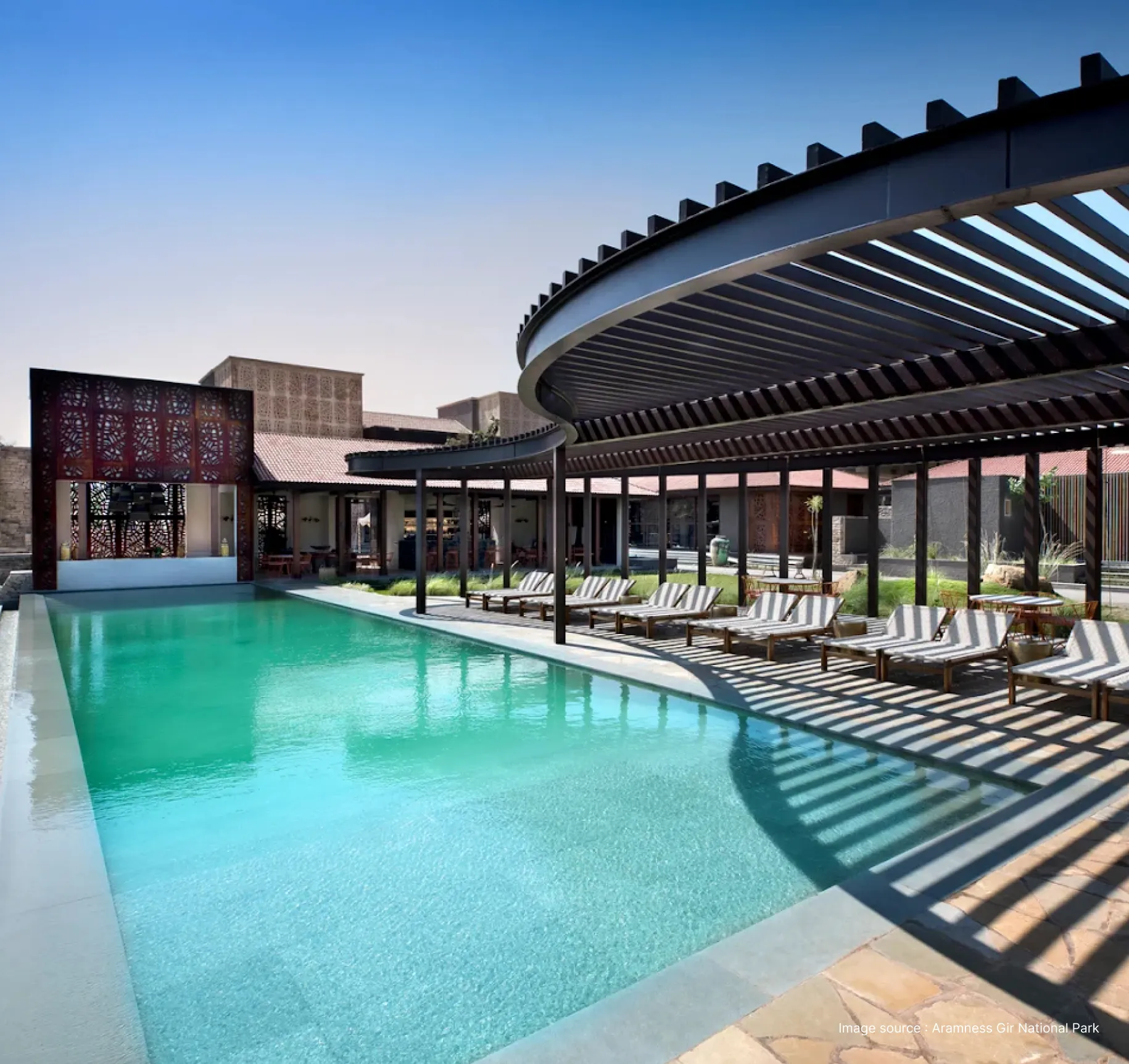 pool view of the aramness gir resort at daytime