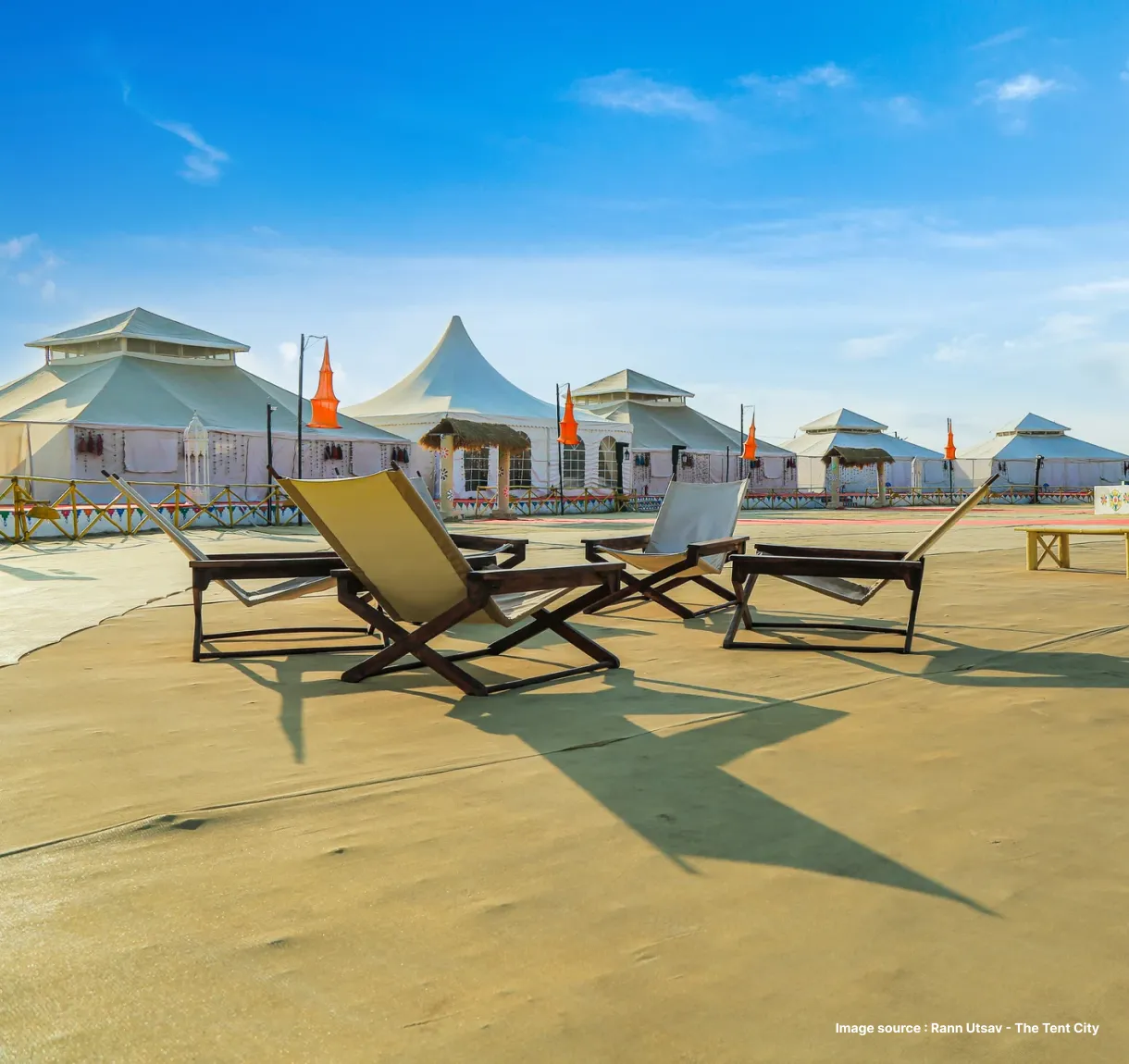tented stays with lounge chairs in the front during the day