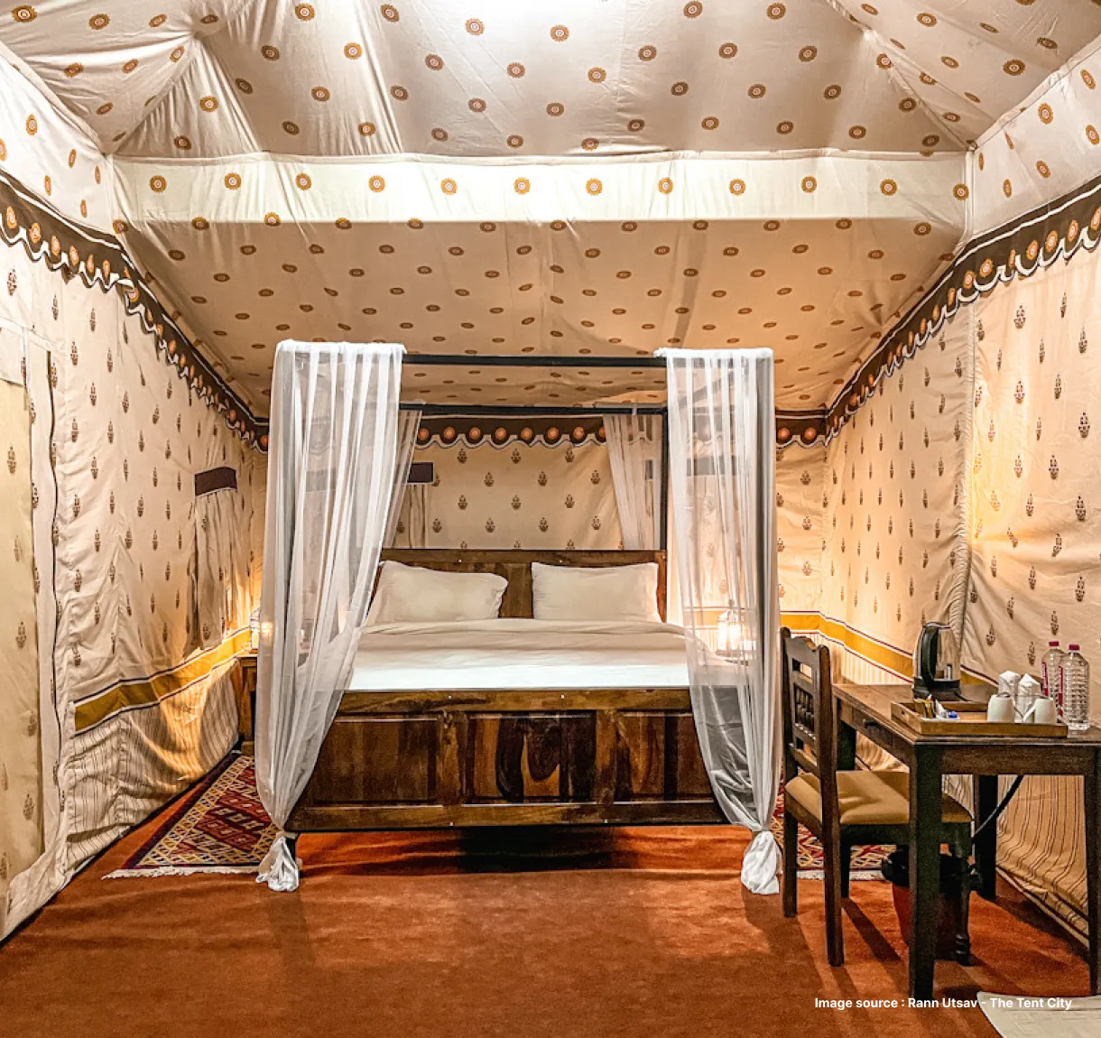 a premium tent stay in rann of kutch, interiors with a luxurious bed