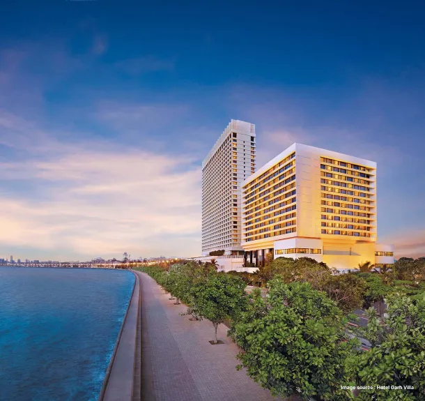 A hotel by the seaside with a sea side view