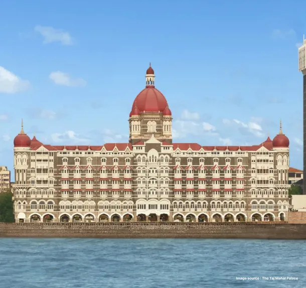 a hotel standing during the day built with traditional Indian architecture