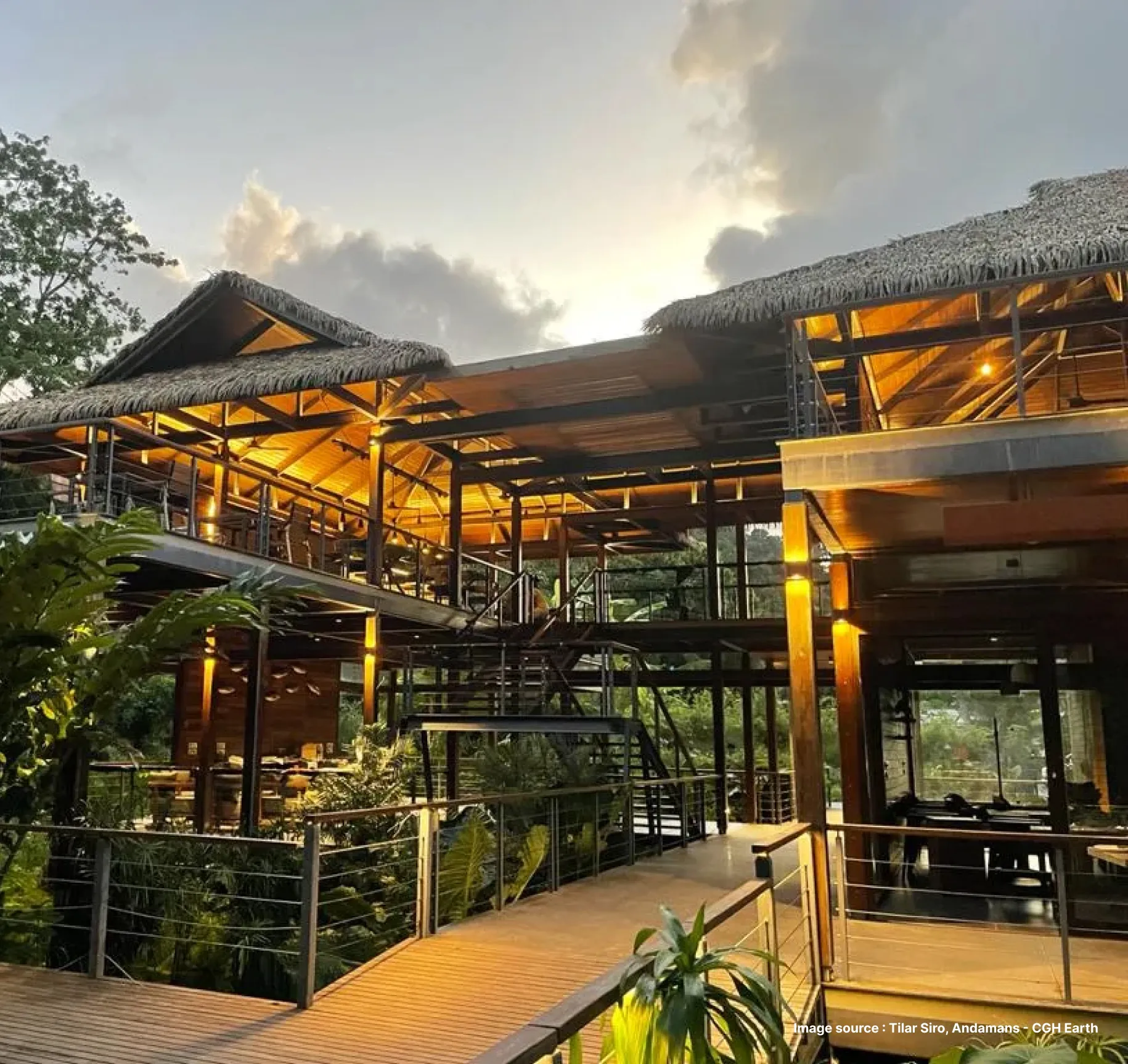 sunset view of the lit up lounge area of tilar siro
