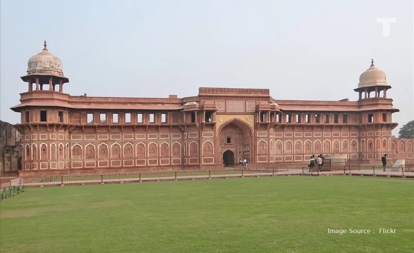 Private car touring through Jaipur's historic streets, showcasing the best golden triangle tour packages in India.