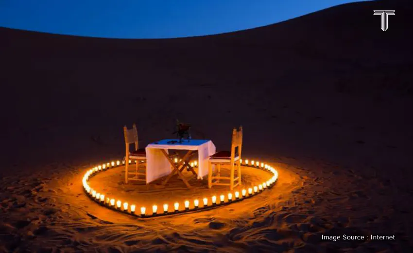 A cinematic shot of a candle light dinner luxury dining in Jaipur in, Rajasthan
