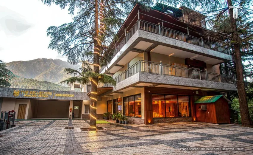 Himalayan retreat featuring Indian wellness in a peaceful mountain landscape with spiritual and healing energies.
