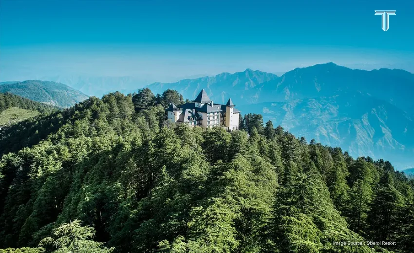 A luxury resort nestled in lush pine forests, offering panoramic Himalayan views—perfect for relaxation on a serene Himalaya tour.